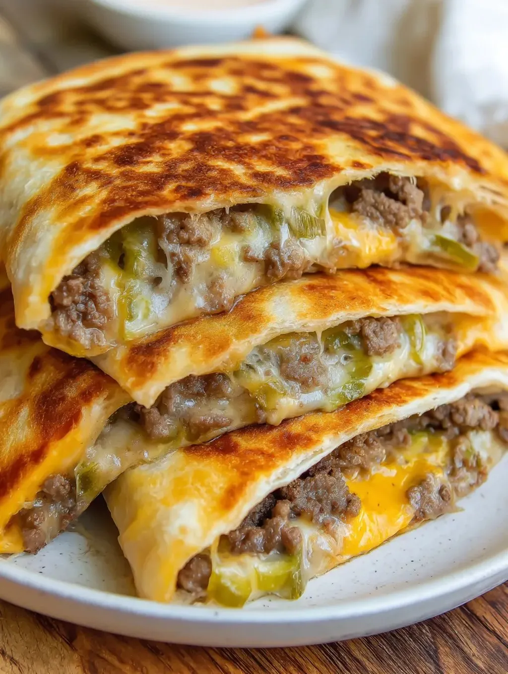 A stack of three quesadillas.